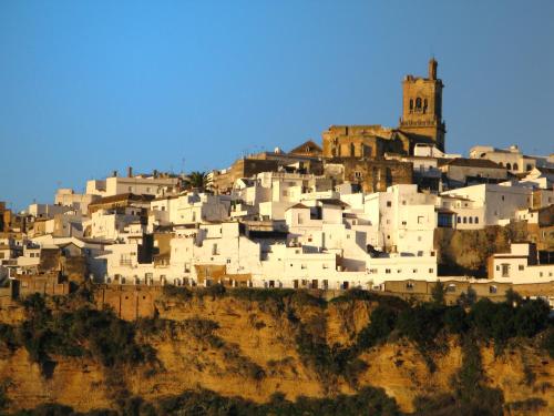 a white village on top of a mountain at Hotel El Convento in Arcos de la Frontera