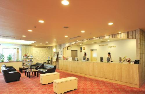 a waiting area in a hospital with a reception counter at Niigata Toei Hotel in Niigata