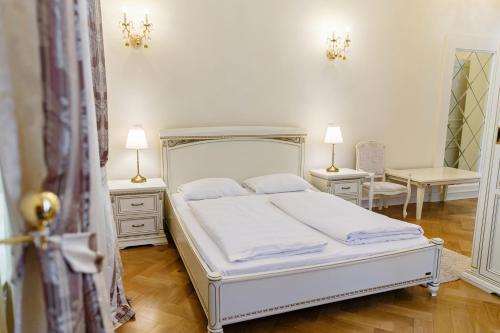 Postel nebo postele na pokoji v ubytování Villa Luttwitz