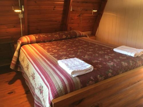 Postel nebo postele na pokoji v ubytování Misky Samay (Dulce Descanso)
