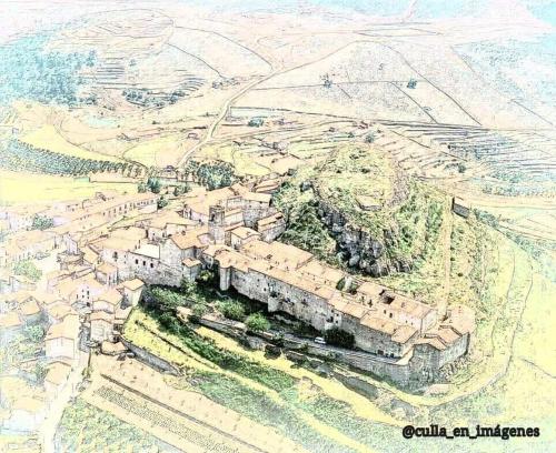 an aerial view of a castle on a hill at La Conquesta de Culla in Culla