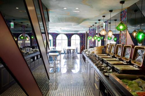 a restaurant with a buffet line with food on display at Norway Forest Travel hotel 1 Taichung in Taichung