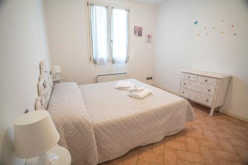 Ένα ή περισσότερα κρεβάτια σε δωμάτιο στο Residence Karina