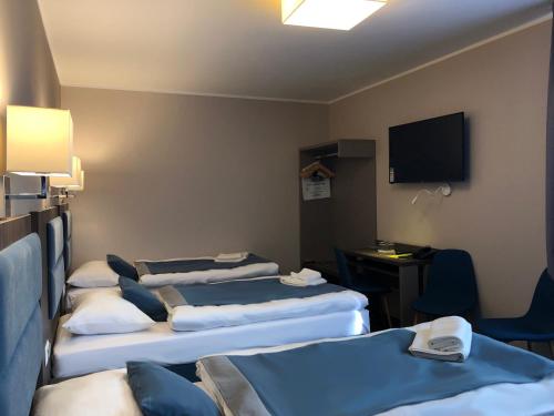 Μια τηλεόραση ή/και κέντρο ψυχαγωγίας στο Hotel Sleep Wrocław