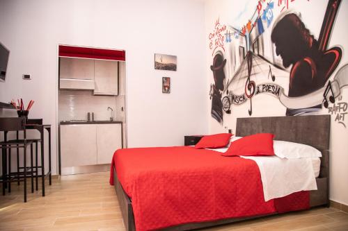 Кровать или кровати в номере Solemare Musica & Poesia