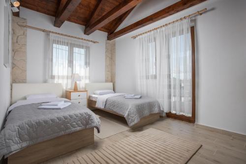 Un pat sau paturi într-o cameră la Villa Marko