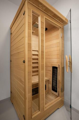a wooden sauna is shown in a room at Villa Marko in Kras