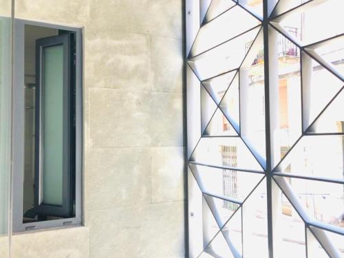 a window on the side of a building at LOFT CENTRE SANTANDER in Santander