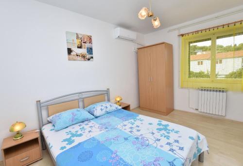 Posteľ alebo postele v izbe v ubytovaní Apartment Dijo I