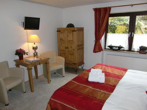 Una cama o camas en una habitación de Hotel Garni Zeranka