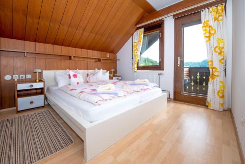 A bed or beds in a room at Gorgeous Chalet