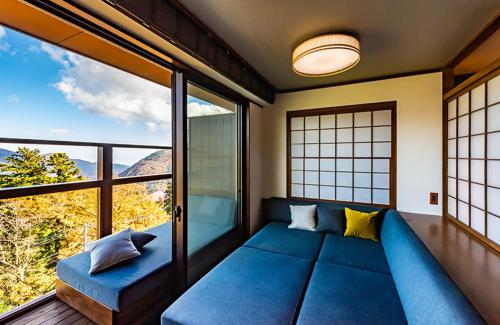 Postel nebo postele na pokoji v ubytování Hakone Kyuan