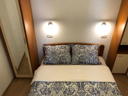 Postel nebo postele na pokoji v ubytování MI-MA Ul. Prilaz 1 51250, Novi Vinodolski, Hrvatska Apartman