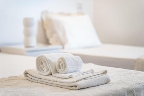 En eller flere senge i et værelse på Vilamoura Marina Apartment with swimming pool