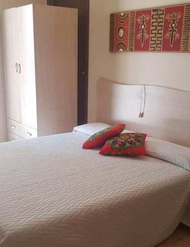 Ένα ή περισσότερα κρεβάτια σε δωμάτιο στο B&B Villa VITTORIO