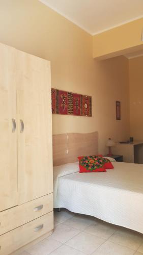 Ένα ή περισσότερα κρεβάτια σε δωμάτιο στο B&B Villa VITTORIO
