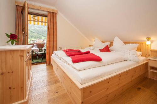 Säng eller sängar i ett rum på Gutzingerhof