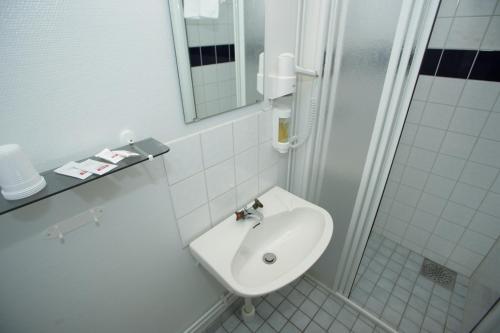 Koupelna v ubytování Yxnerum Hotell