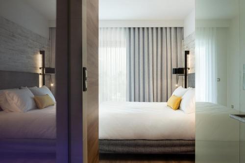 Postel nebo postele na pokoji v ubytování Euphoria Resort - All Inclusive