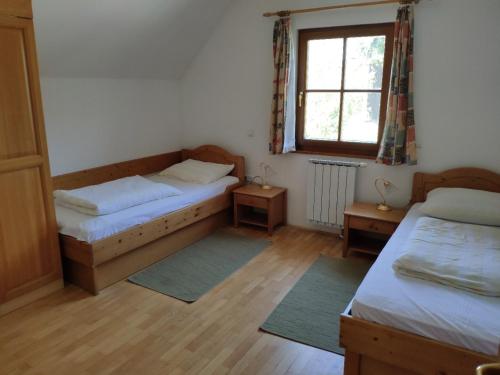 Postel nebo postele na pokoji v ubytování Antela, 142 m2 appartment for 12 person in Mariborsko Pohorje