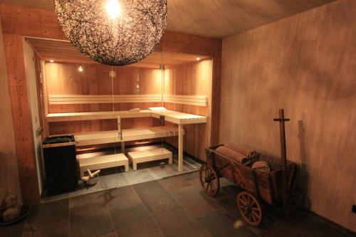 a room with a sauna with a wagon in it at Mountain Chalet R in Berwang