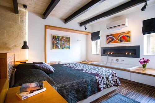 Ένα ή περισσότερα κρεβάτια σε δωμάτιο στο THE LOFT