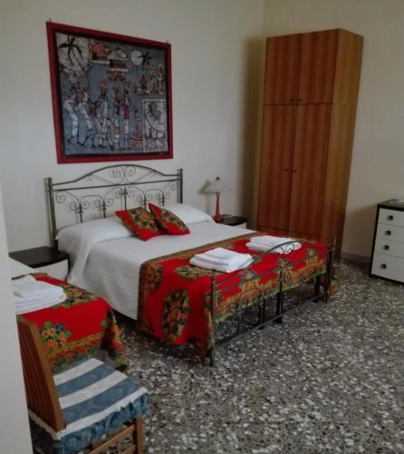 Ένα ή περισσότερα κρεβάτια σε δωμάτιο στο B&B Villa VITTORIO