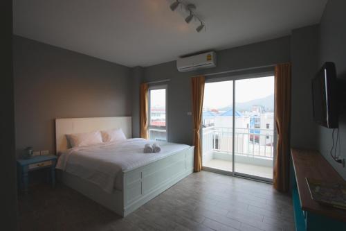 Una cama o camas en una habitación de Hub Hua Hin 57