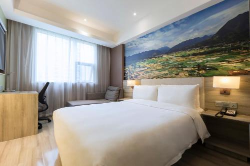 Atour Hotel Xi'an (Wenjing Road, North 2nd Ring Roadにあるベッド
