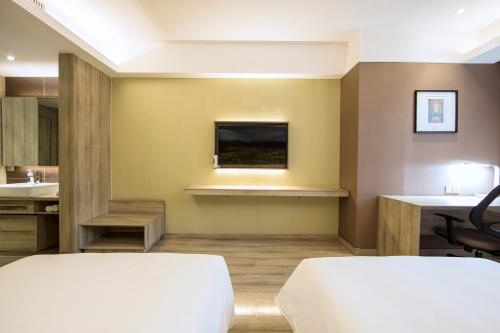 Atour Hotel Xi'an (Wenjing Road, North 2nd Ring Roadにあるベッド