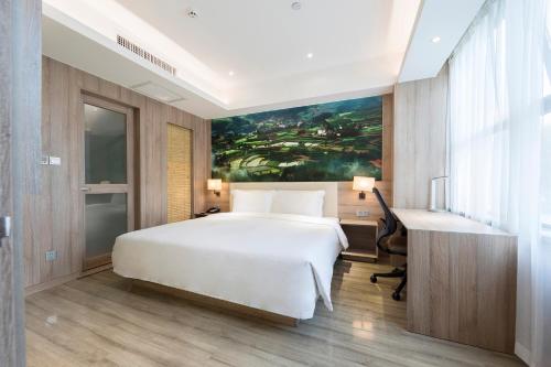 Atour Hotel Xi'an (Wenjing Road, North 2nd Ring Roadにあるベッド
