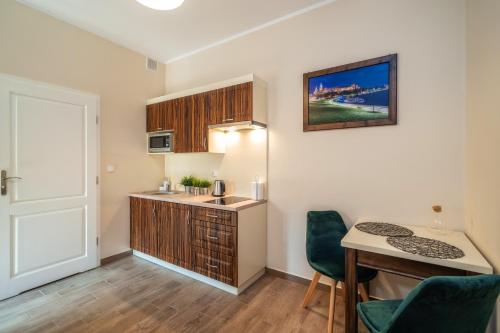 Cucina o angolo cottura di Apartments 17 Szewska