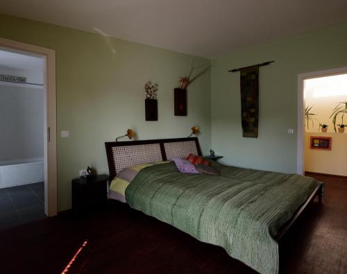 Ένα ή περισσότερα κρεβάτια σε δωμάτιο στο The rooms Bed & Breakfast