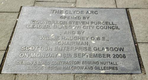 a plaque on the side of a sidewalk at Elegant Apartment Near SECC/HYDRO in Finnieston, Glasgow in Glasgow