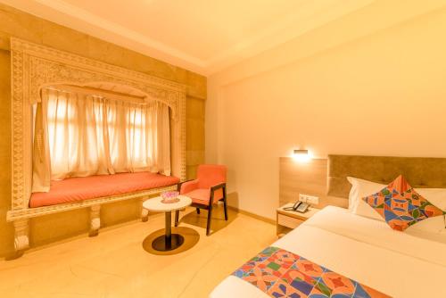 Una cama o camas en una habitación de Hotel Antra Inn