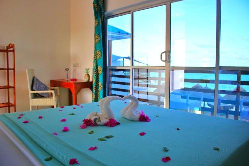 Ένα ή περισσότερα κρεβάτια σε δωμάτιο στο TheSpot