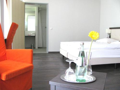 Postel nebo postele na pokoji v ubytování Hotel FIT