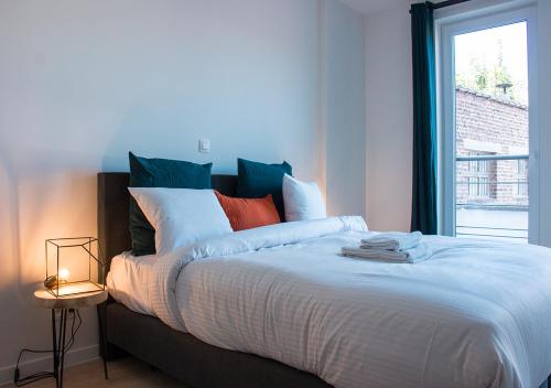 Postel nebo postele na pokoji v ubytování Smartflats - EU Commission