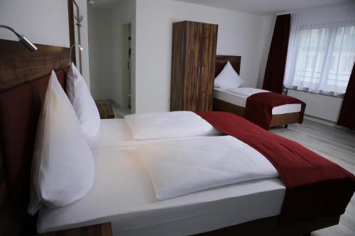 Кровать или кровати в номере Hotel Grand Corner
