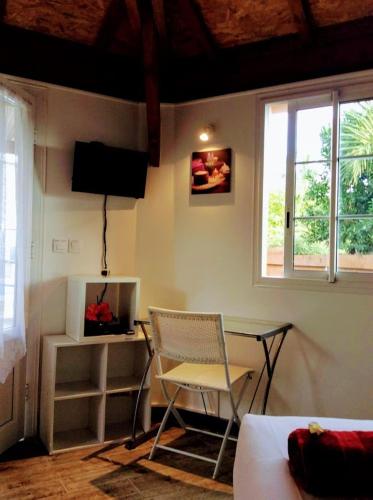 Телевизор и/или развлекательный центр в Chalet BIENVENUE NOUT KAZ