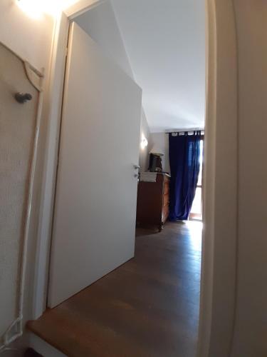 an open door to a room with a hallway at B&B La Casa di Alice in Foligno
