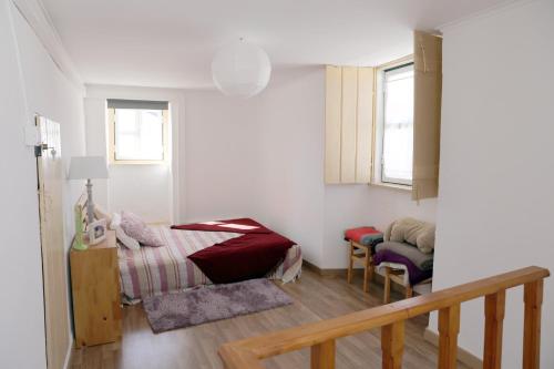 Ένα ή περισσότερα κρεβάτια σε δωμάτιο στο Azeitão Village