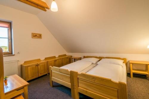 Cama o camas de una habitación en Horský Hotel Kohútka