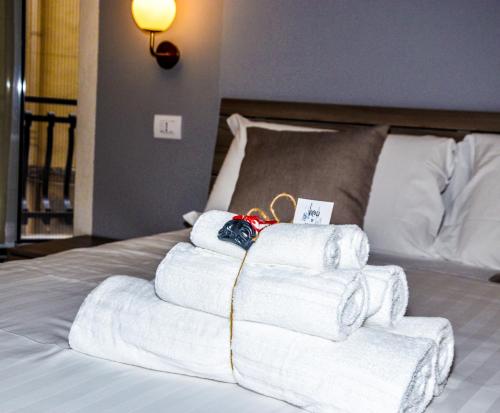 Postel nebo postele na pokoji v ubytování Vicoli di Napoli B&B