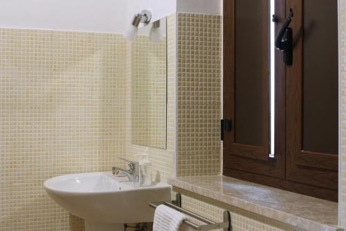 Koupelna v ubytování Albergo Diffuso di Campolattaro