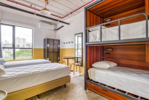 Krevet ili kreveti u jedinici u okviru objekta Selina Madalena Sao Paulo