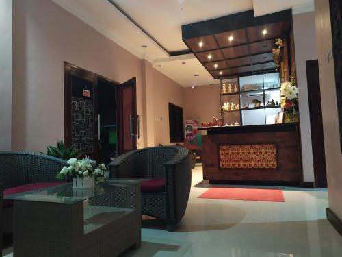 Χώρος καθιστικού στο RedDoorz @ Jalan Cendrawasih Timika