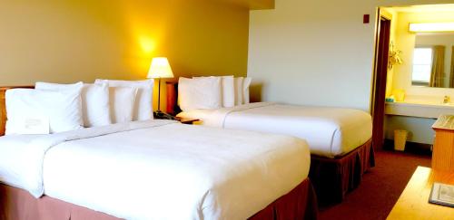 Postel nebo postele na pokoji v ubytování Berlin Heritage Inn