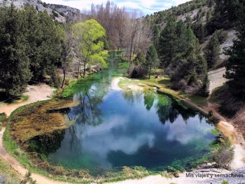 an aerial view of a pool of water in a river at El Balcon Del Cañon in Ucero