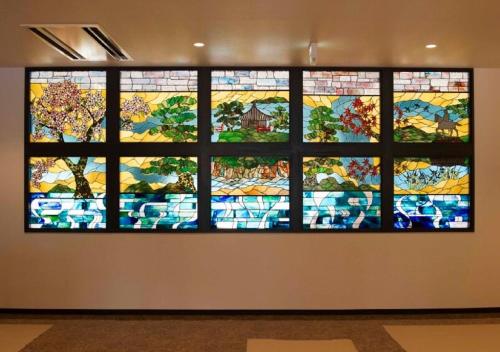a large stained glass window on a wall at Higashimatsushima - Hotel / Vacation STAY 43089 in Higashimatsushima